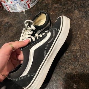 Black vans. Women size 7. Mens size 5.5. Worn once